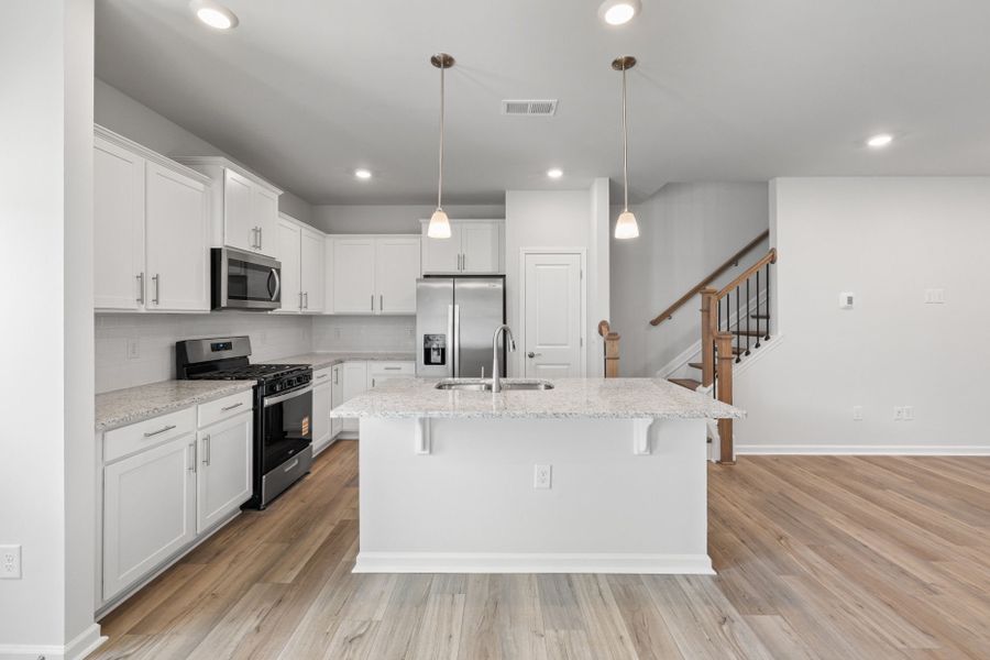 Furnished interior view inside a new home in Poets Walk, Whitsett (Image 9).