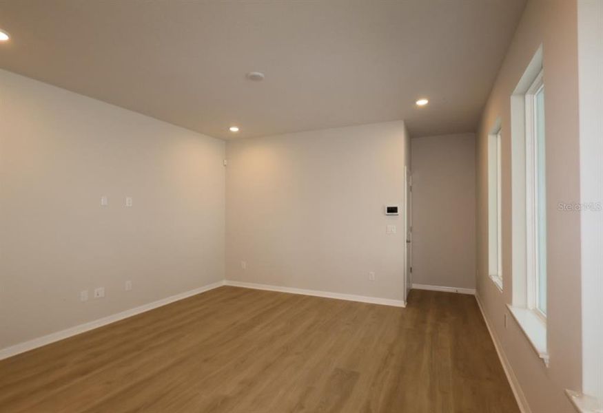 Spacious, unfurnished interior of a new home in Laureate Park at Lake Nona - Garden Series, Orlando (Image 24).