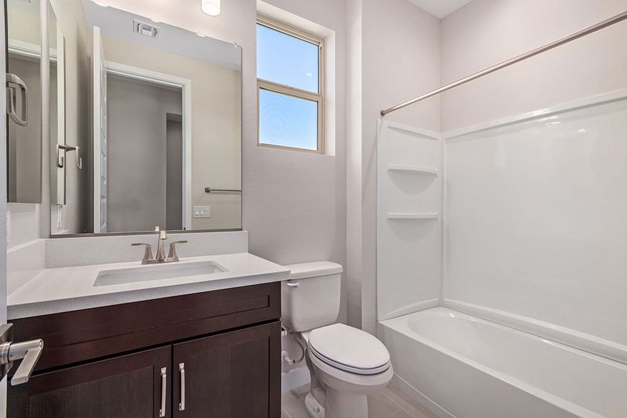 Representative furnished interior of a home built from the Zafiro by Taylor Morrison in CantaMia at Estrella 55+, Goodyear (Image 10).