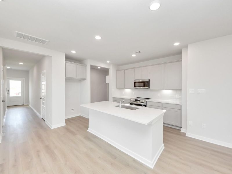 Furnished interior view inside a new home in Spring Branch Crossing, Conroe (Image 6).