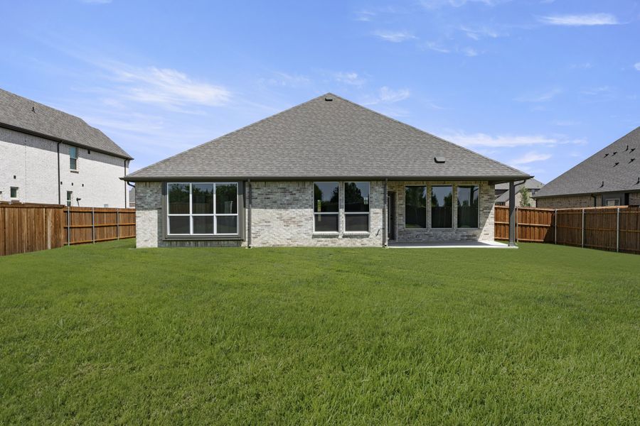 Exterior details and patio area of a home in Lovers Landing, Forney (Image 4). Exterior details and patio area of a home in Lovers Landing, Forney (Image 4).