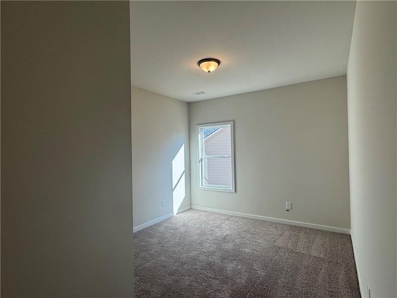Spacious, unfurnished interior of a new home in Rosewood Lake Preserve, Hoschton (Image 13).