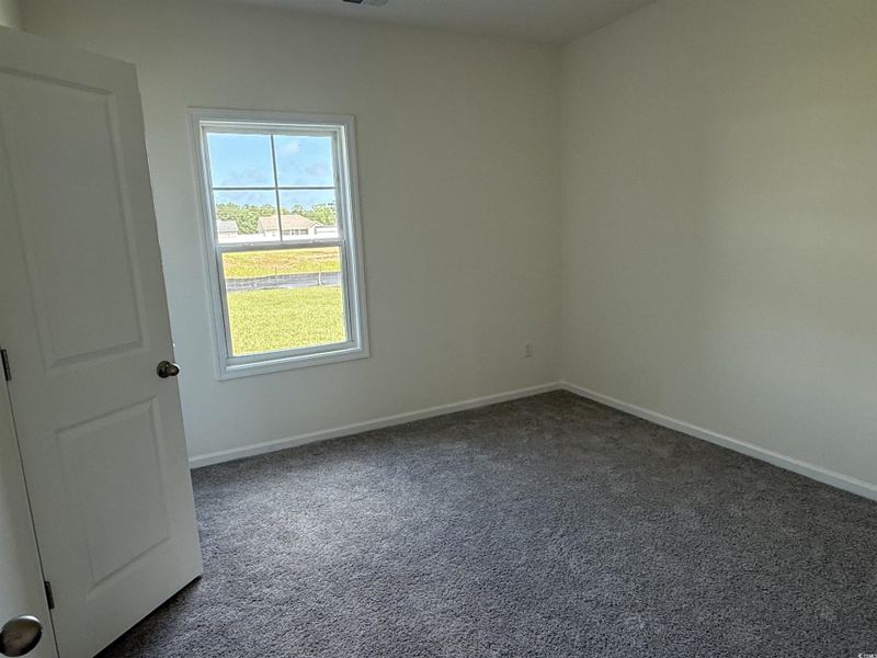 Bathroom with wood finished floors, vanity, and shower / tub combination Bathroom with wood finished floors, vanity, and shower / tub combination