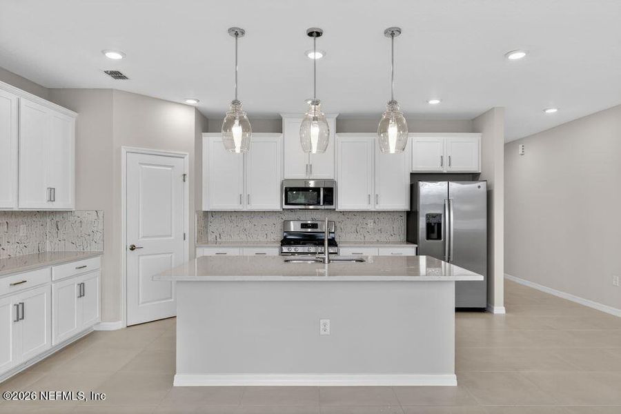 Furnished interior view inside a new home in Cherry Elm at SilverLeaf, St. Augustine (Image 7).