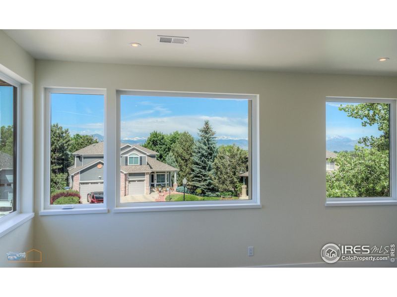 Primary Bedroom With Excellent Foothill And Back Range Views And Fireplace