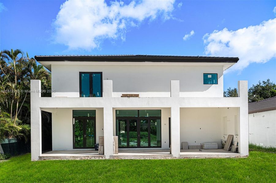 Front exterior of a new home in , Miami, FL, highlighting curb appeal (Image 1).