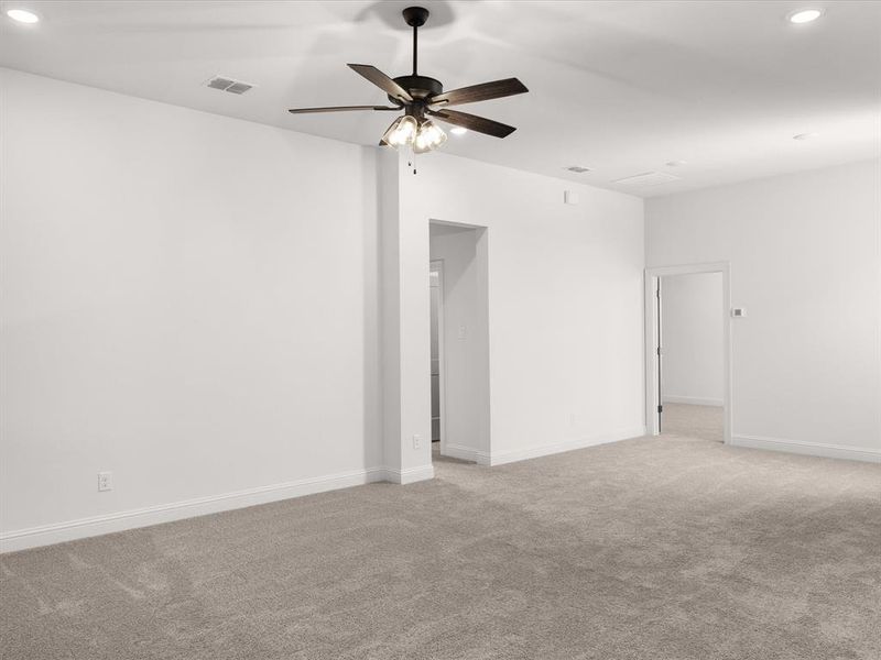 Unfurnished room featuring recessed lighting, light carpet, and ceiling fan