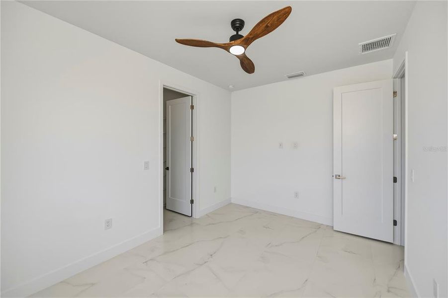 Spacious, unfurnished interior of a new home in , Port Charlotte (Image 54).