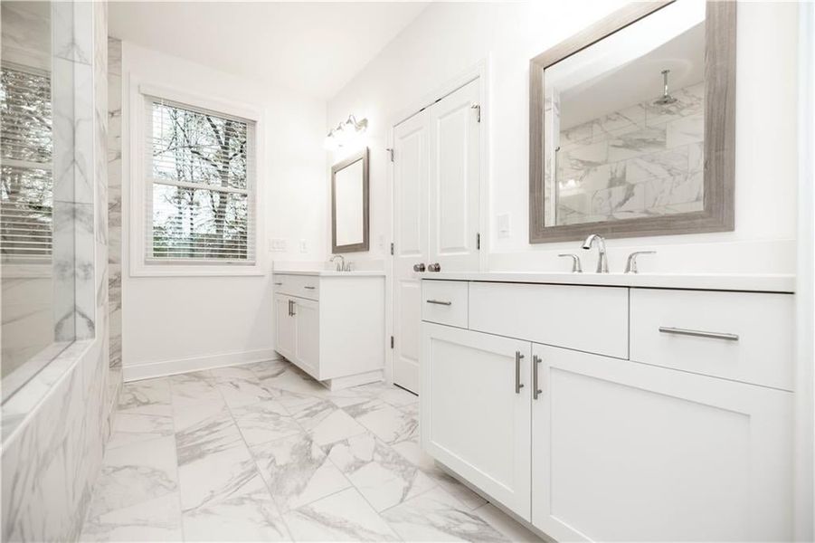 Very nice layout in the bathroom, double doors. Pictures represent a previously built home not the actual home, home is under construction.