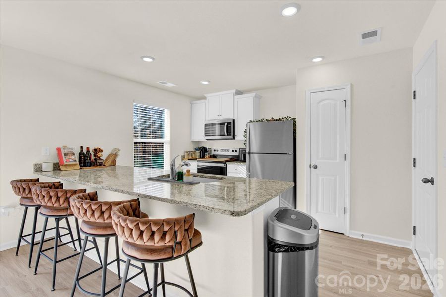 Furnished interior view inside a new home in , Charlotte (Image 8).