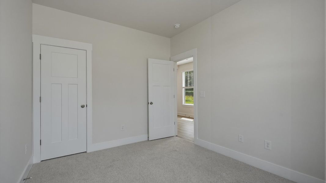 A thoughtfully crafted flex room offering exceptional versatility for today's dynamic lifestyle by DRB Homes