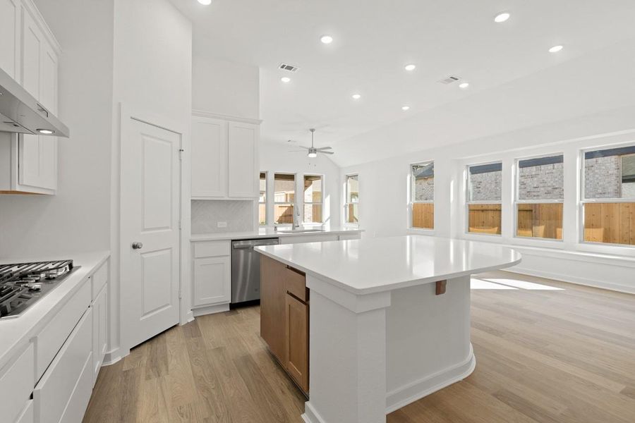Furnished interior view inside a new home in Sunterra, Katy (Image 11).