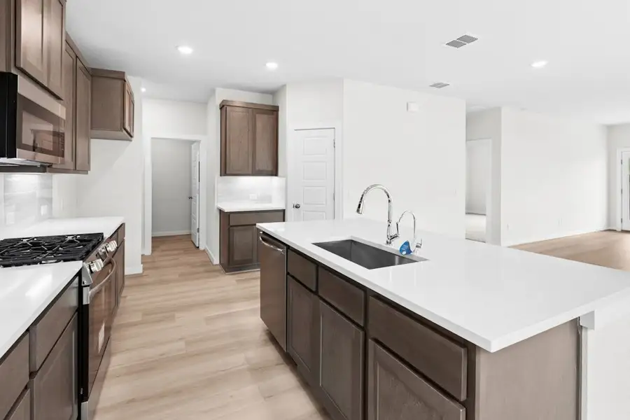 Furnished interior view inside a new home in Willowbrook, New Braunfels (Image 6). Furnished interior view inside a new home in Willowbrook, New Braunfels (Image 6).