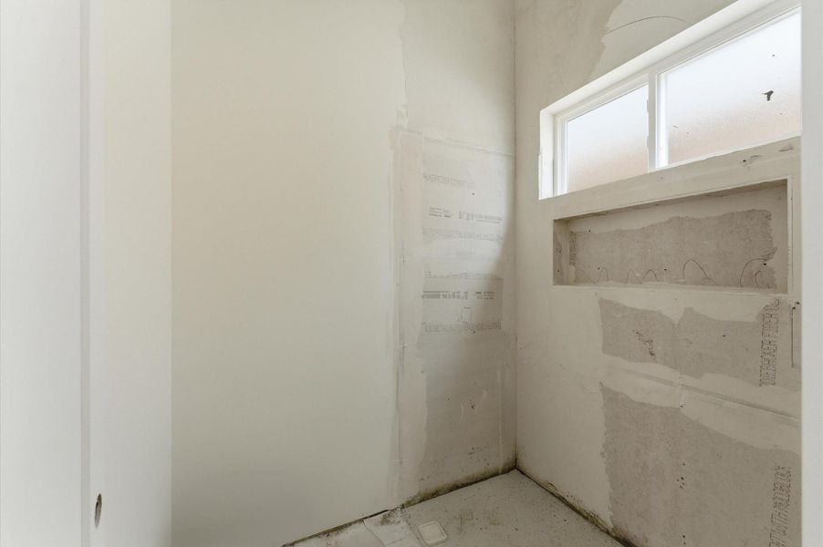 Full bathroom with a shower for the guest suite.