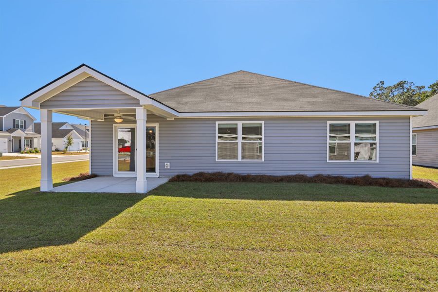 Exterior details and patio area of a home in Heritage at New Riverside, Bluffton (Image 2).