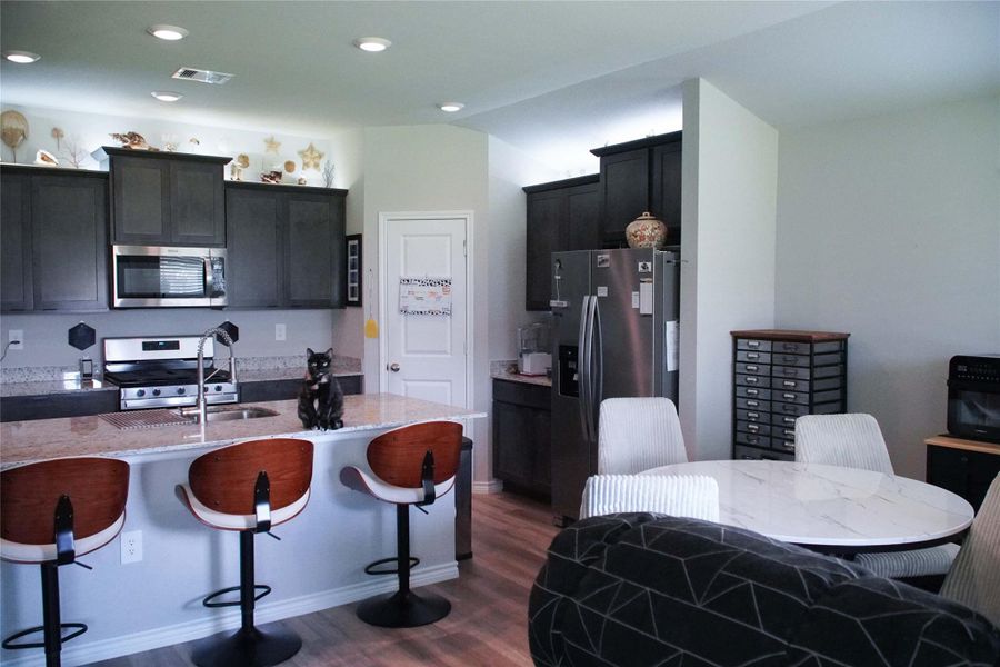Kitchen and dining area Kitchen and dining area