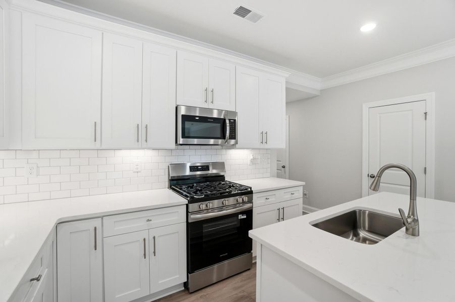 Furnished interior view inside a new home in Harrisburg Village Townhomes, Harrisburg (Image 13).