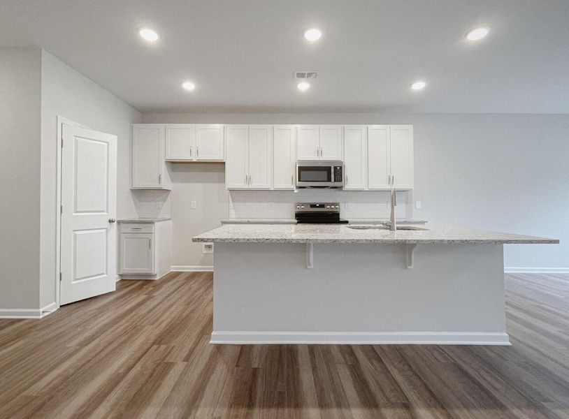 Furnished interior view inside a new home in East Main Townes, Spartanburg (Image 7).
