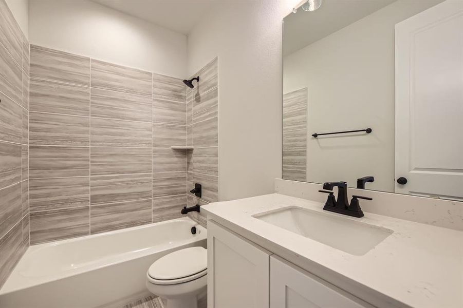 Bathroom with vanity and shower / bathtub combination Bathroom with vanity and shower / bathtub combination