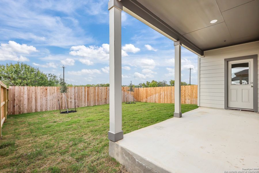 Exterior details and patio area of a home in Garden Grove, Schertz (Image 21).