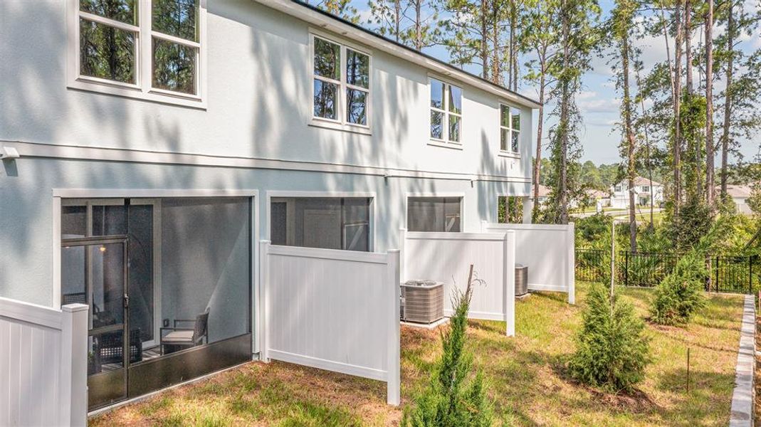 Front exterior of a new home in Stokes Landing, St. Augustine, FL, highlighting curb appeal (Image 23).