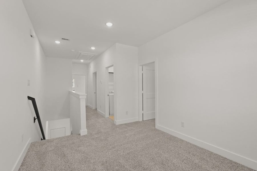 Representative unfurnished interior of a home built from the Cheverny by Chesmar Homes in Santa Rita Ranch, Liberty Hill (Image 10).