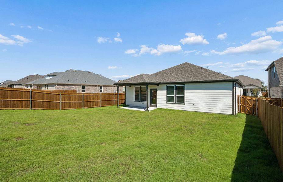 Exterior details and patio area of a home in Rosemary Fields, Godley (Image 3).