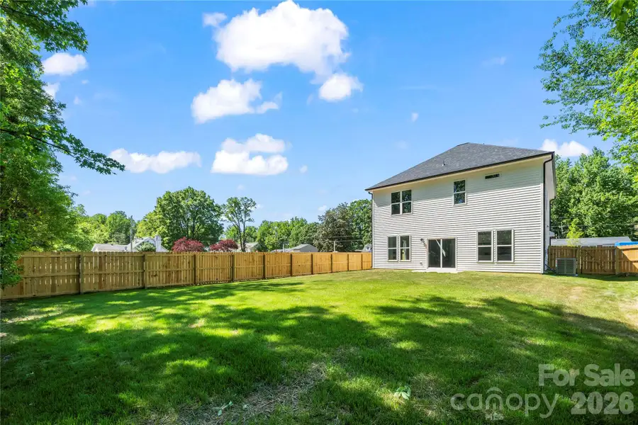 Exterior details and patio area of a home in , Charlotte (Image 25).