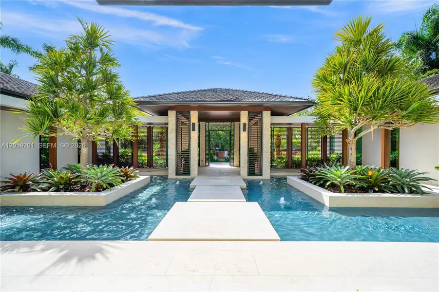 Exterior details and patio area of a home in , Coral Gables (Image 3).