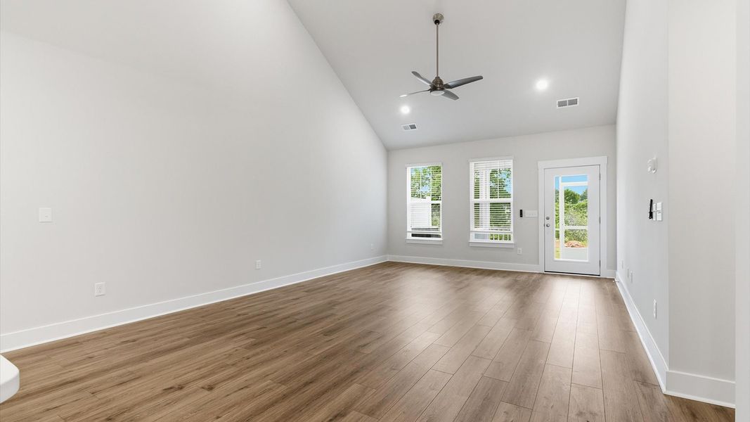 Highly skilled craftsmanship and modern elegance meet in this family room with soaring ceilings located in Anderson, SC Highly skilled craftsmanship and modern elegance meet in this family room with soaring ceilings located in Anderson, SC