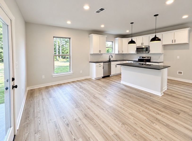 Spacious, unfurnished interior of a new home in Hickory Cove, Burns (Image 15).