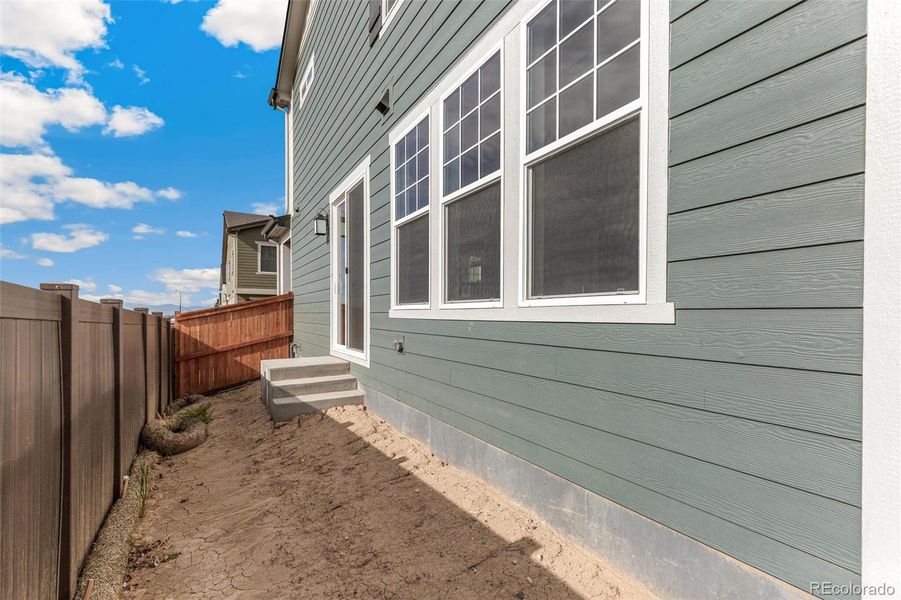 Exterior details and patio area of a home in Sky Ranch Villas, Watkins (Image 3). Exterior details and patio area of a home in Sky Ranch Villas, Watkins (Image 3).