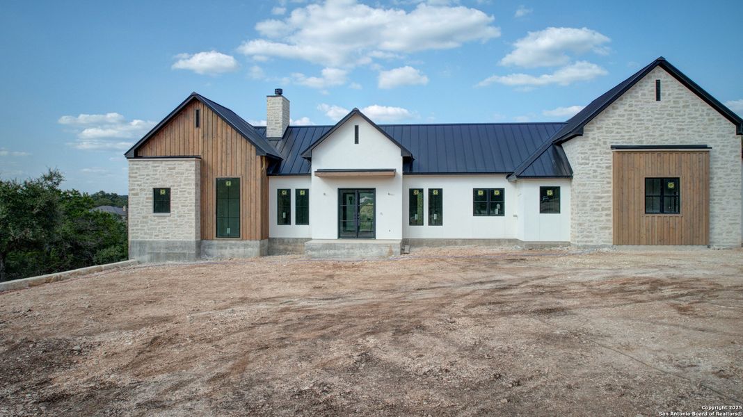 Front exterior of a new home in , New Braunfels, TX, highlighting curb appeal (Image 17). Front exterior of a new home in , New Braunfels, TX, highlighting curb appeal (Image 17).