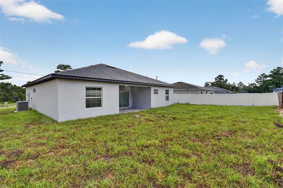 Exterior details and patio area of a home in , Poinciana (Image 3).