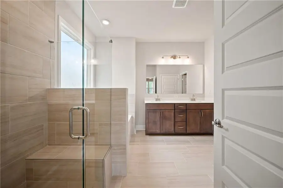 Furnished interior view inside a new home in Oak Ridge Meadows - Active Adult, Locust Grove (Image 5).