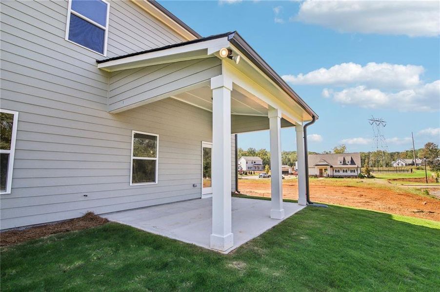 Front exterior of a new home in Ponderosa Farms Estates, Gainesville, GA, highlighting curb appeal (Image 19).