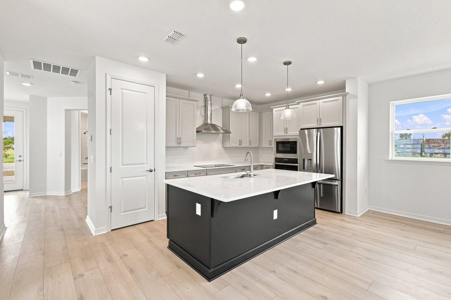 Furnished interior view inside a new home in Weslyn Park in Sunbridge 34', St. Cloud (Image 5). Furnished interior view inside a new home in Weslyn Park in Sunbridge 34', St. Cloud (Image 5).
