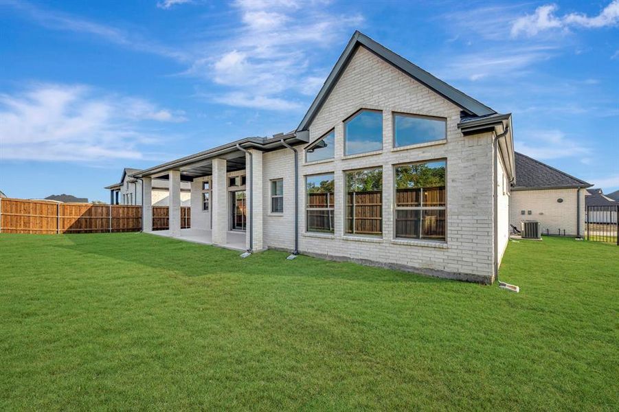 Exterior details and patio area of a home in Northshore at Lakewood Village - Garden Series, Lakewood Village (Image 2). Exterior details and patio area of a home in Northshore at Lakewood Village - Garden Series, Lakewood Village (Image 2).