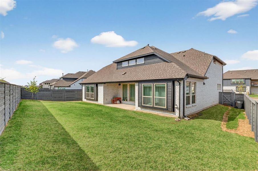 Exterior details and patio area of a home in , Little Elm (Image 4).