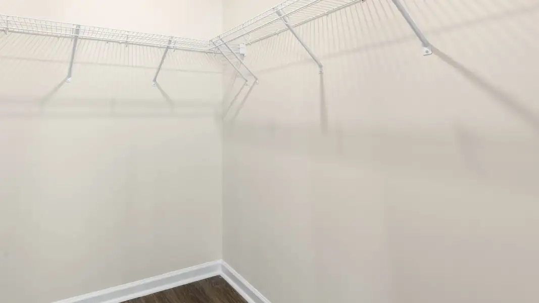Spacious, unfurnished interior of a new home in The Villas at Galvins Ridge, Sanford (Image 28).
