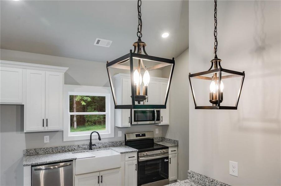 Furnished interior view inside a new home in , Buchanan (Image 9).