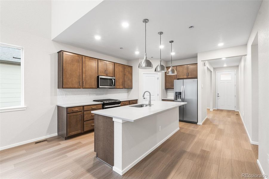 Furnished interior view inside a new home in Harvest Crossing, Aurora (Image 7).