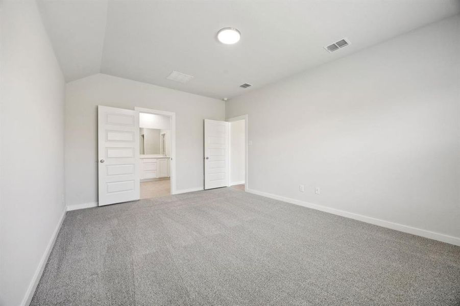 Primary Suite in the Emmy II home plan by Trophy Signature Homes - REPRESENTATIVE PHOTO