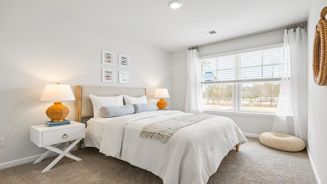 Furnished interior view inside a new home in The Crossing at St. James, Goose Creek (Image 24).