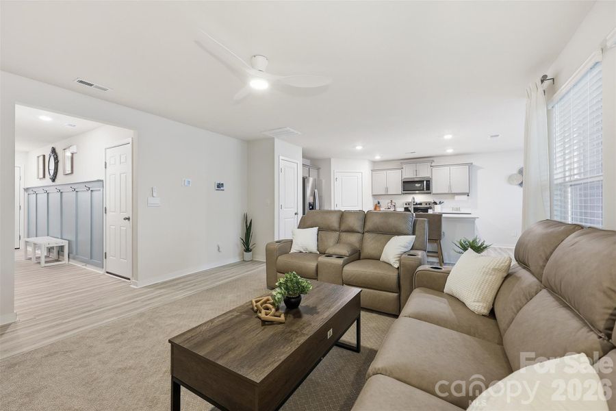 living room, open to kitchen, view into foyer