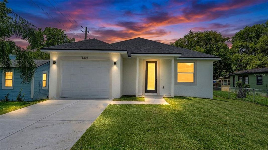 Front exterior of a new home in , Lakeland, FL, highlighting curb appeal (Image 26).