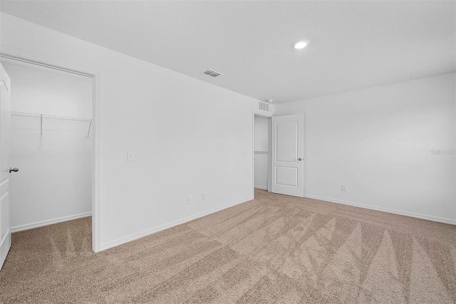 Spacious, unfurnished interior of a new home in Noah Estates at Tuscany Preserve, Poinciana (Image 10).