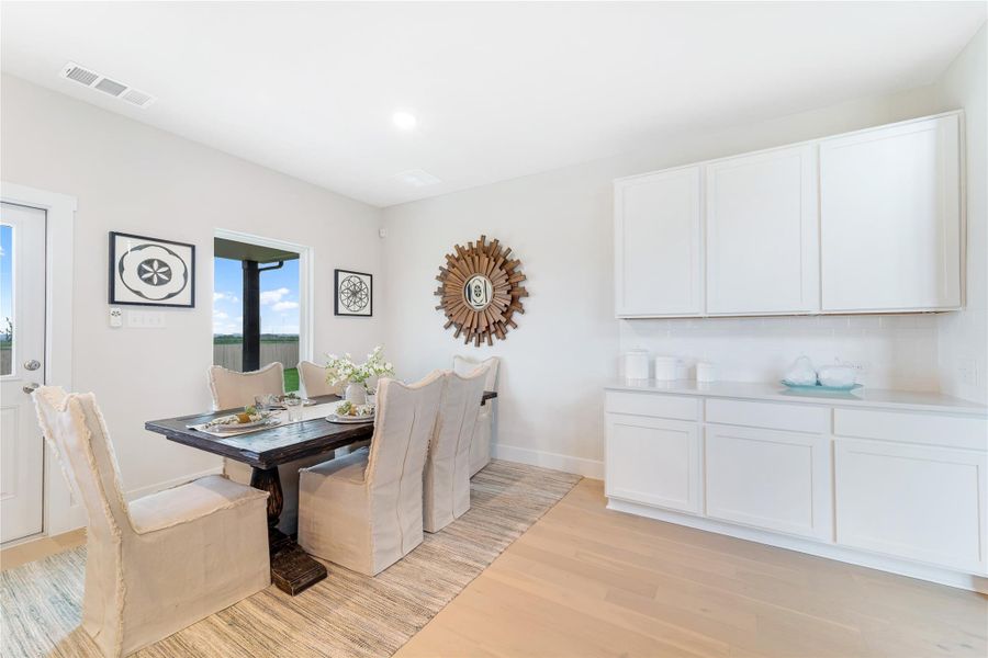 Furnished interior view inside a new home in Massey Oaks, Pearland (Image 5).