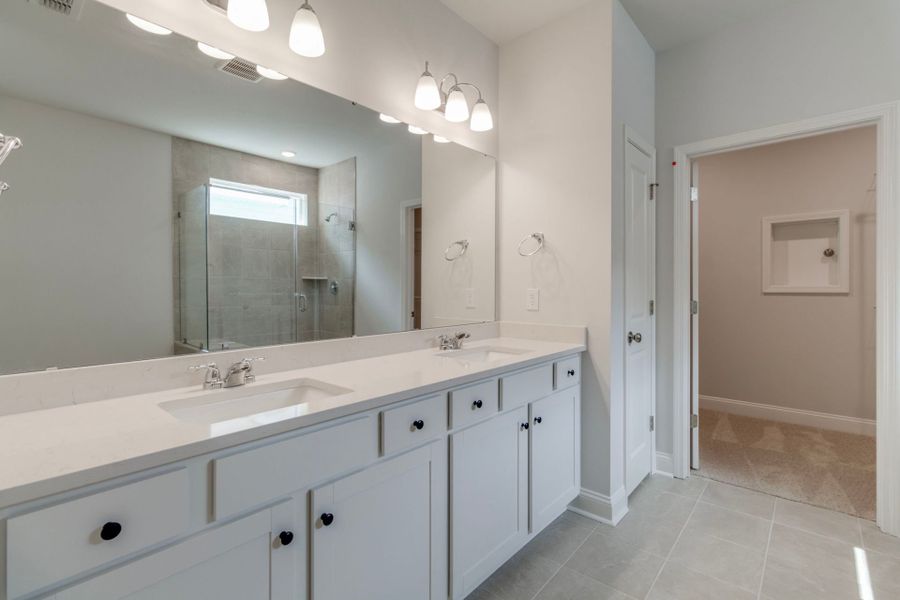 Dual sinks in the Owner's Spa Bathroom
