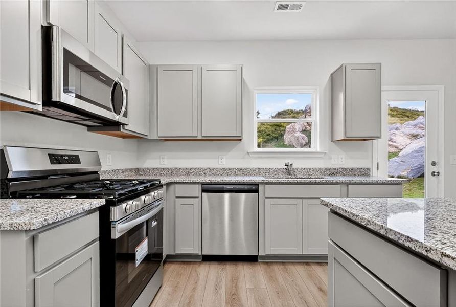 Furnished interior view inside a new home in Laurel Creek, Calhoun (Image 3).